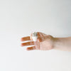 Hand holding out the hardy Candace Mini Cactus and Handmade White Ceramic Planter